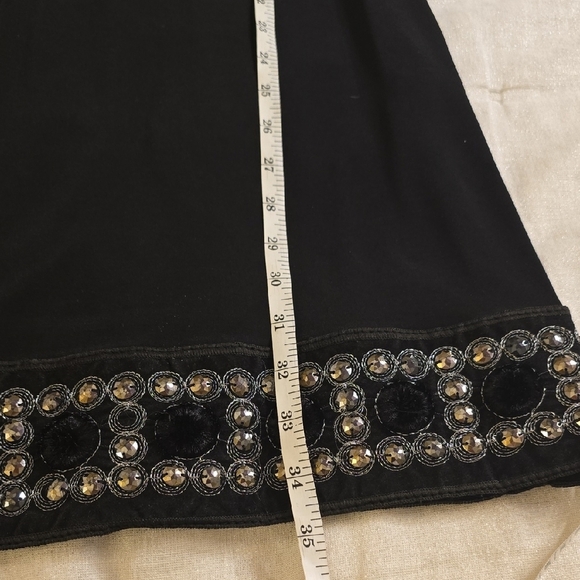 Tiana B. Elegant Black Dress with Embellished Cuffs - Picture 8 of 15